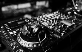 dj spinning mixing scratching track controls dj s deck strobe dj music club life concept